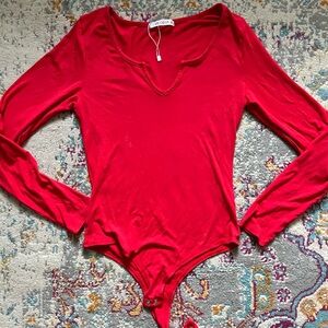 Red bodysuit never worn